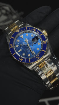 Reloj Rolex Submariner de acero inoxidable y oro amarillo con esfera azul y índices 126613LB