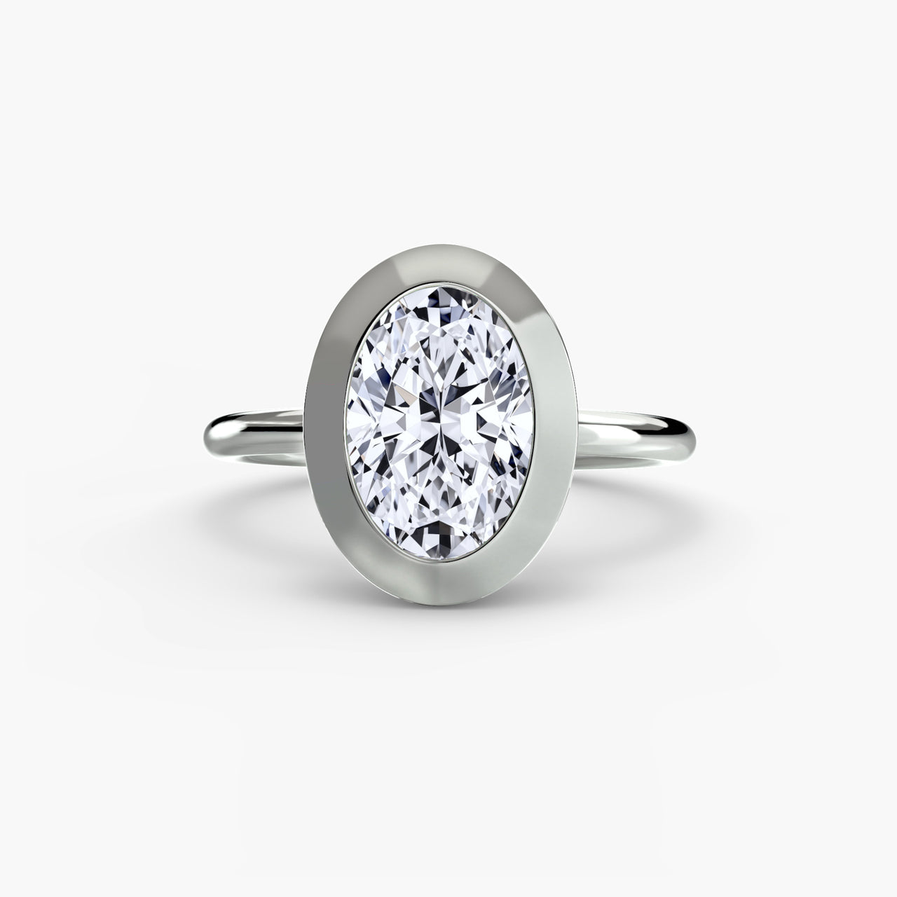 14K White Gold / Oval The Bezel Set Solitaire
