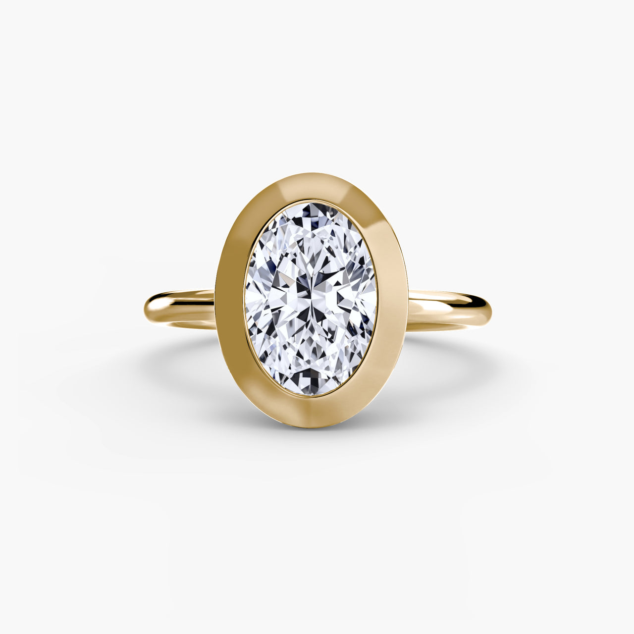14K Yellow Gold / Oval The Bezel Set Solitaire