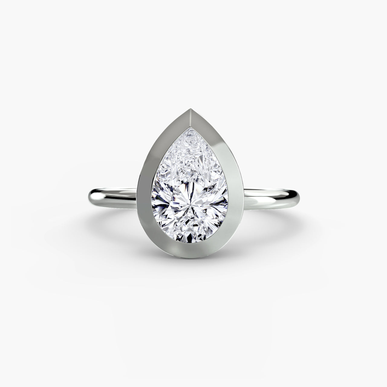 14K White Gold / Pear The Bezel Set Solitaire
