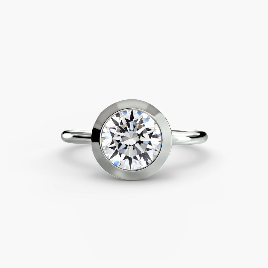 14K White Gold / Round The Bezel Set Solitaire
