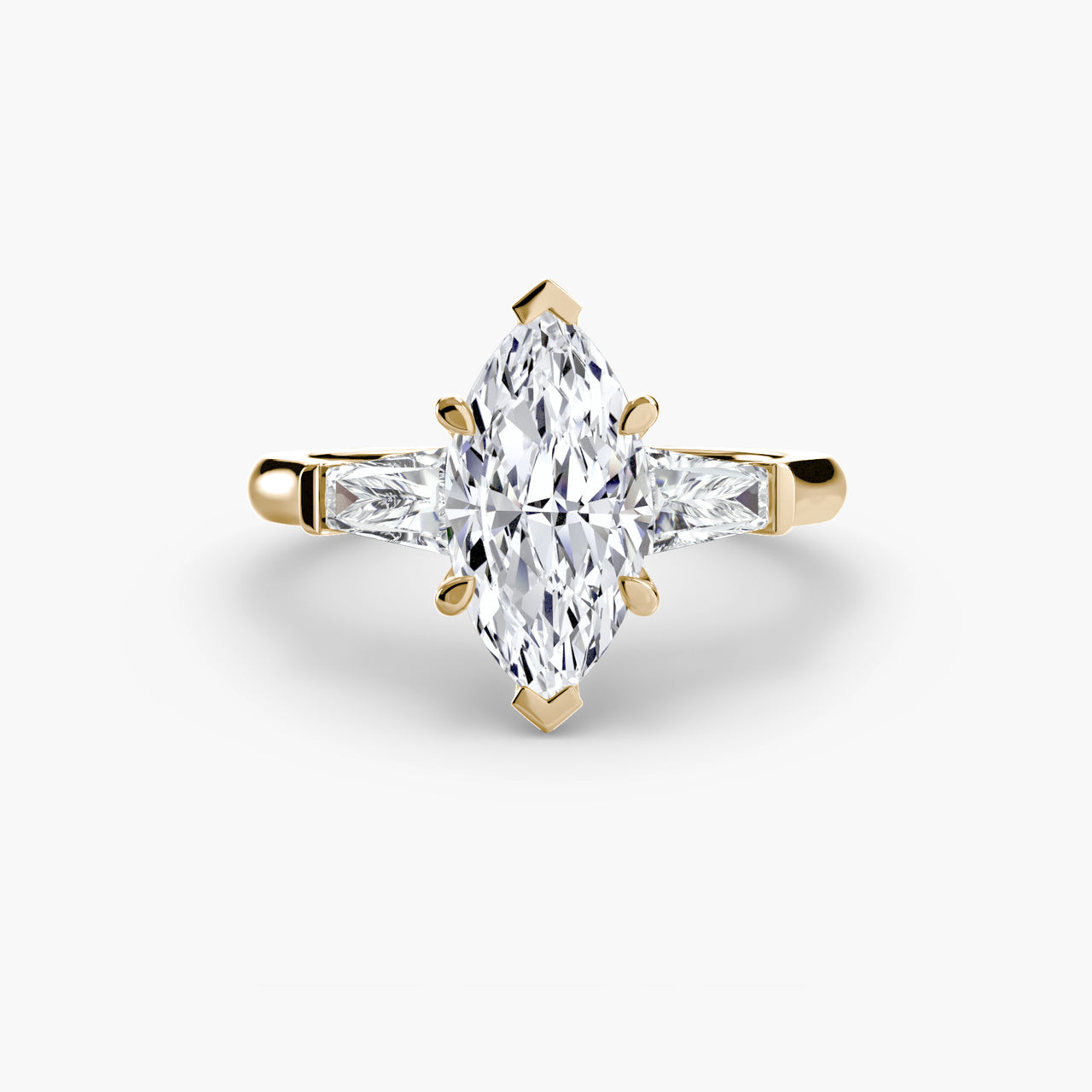 14K Yellow Gold / Marquise Three-Stone Ring (Baguette Side Stones)