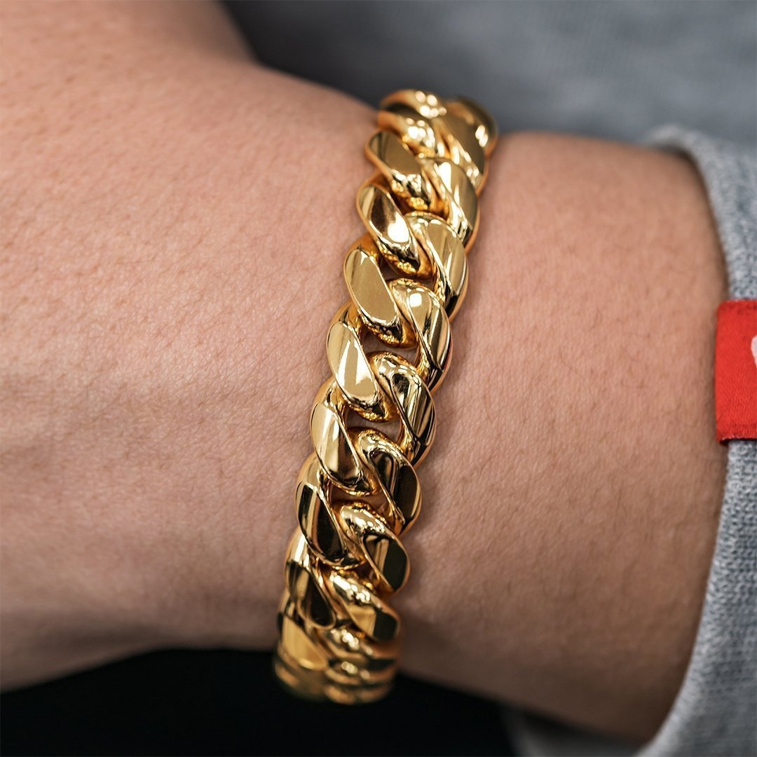 14K Gold Bezel Pear Shaped Diamond Cuban Link Bracelet