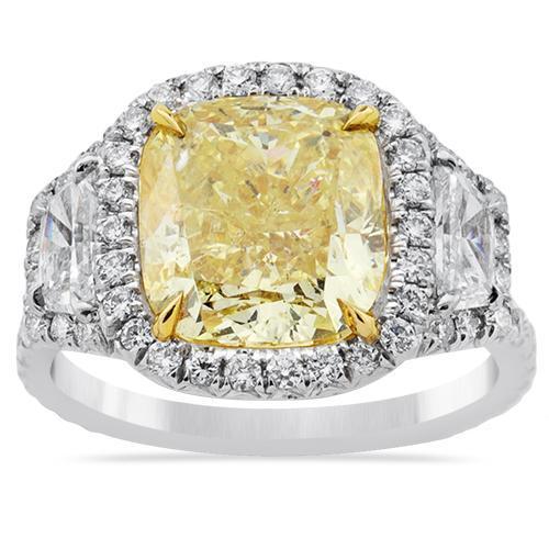 Three Stone Fancy Yellow Diamond Ring in Platinum and 18k White Gold 6.51 Ctw