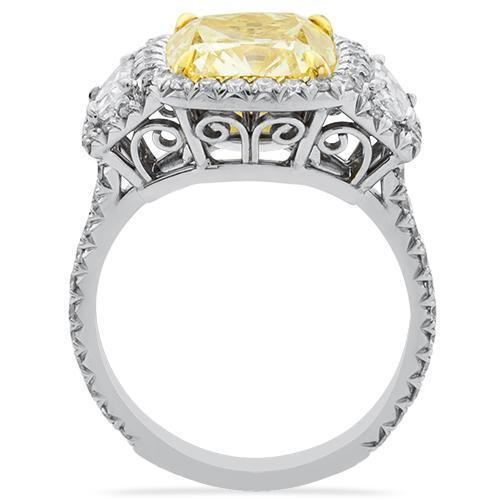 Three Stone Fancy Yellow Diamond Ring in Platinum and 18k White Gold 6.51 Ctw